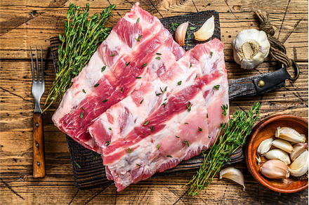 Fresh raw pork rack spareribs with