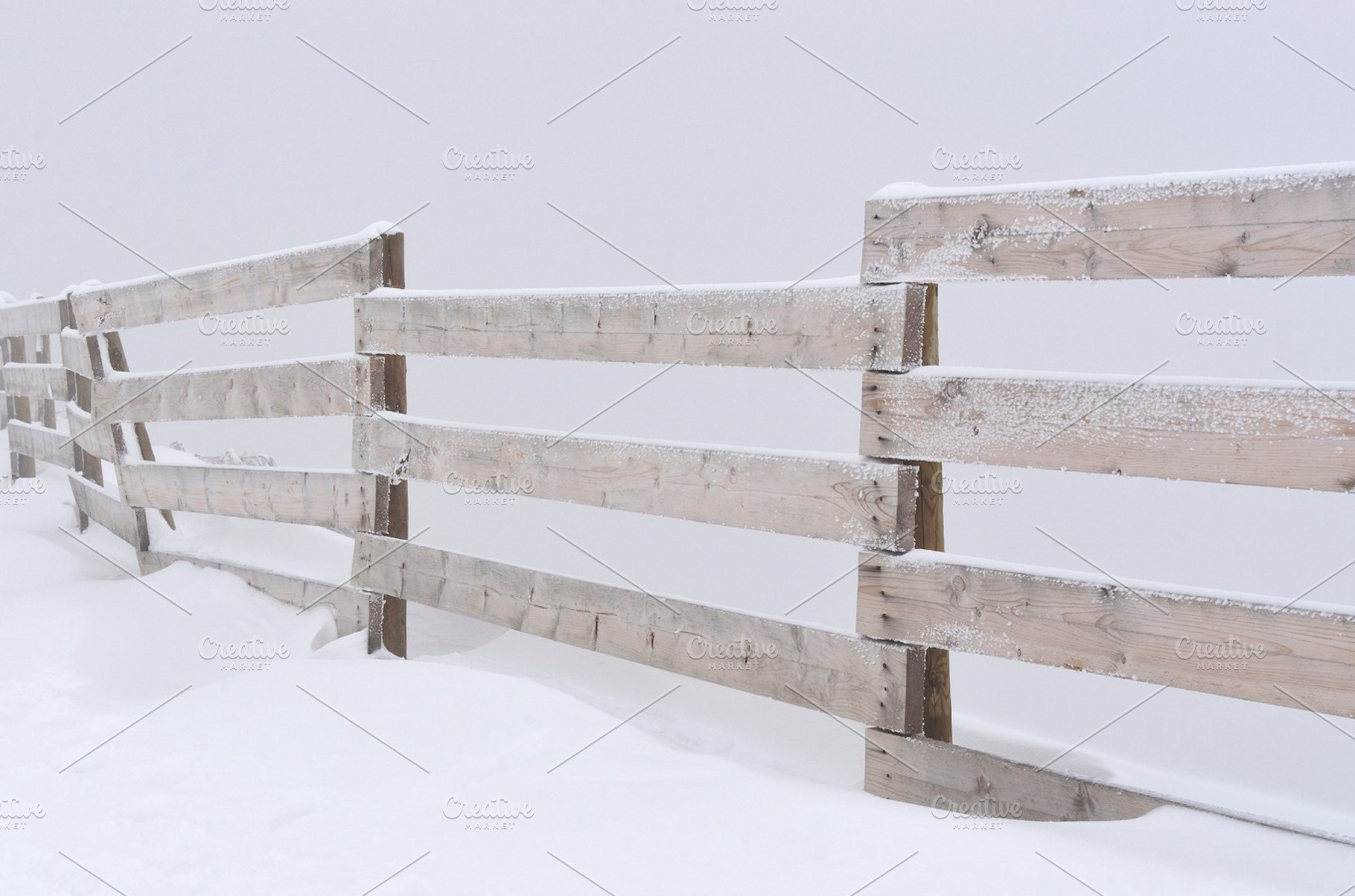 wooden fence and snow, a Nature Photo by jcfmorata - Photography