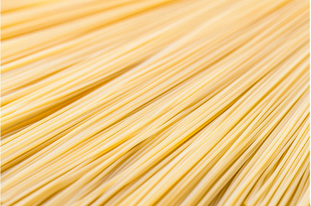 Close up view of uncooked spaghetti, a Food & Drink Photo by Lermont51