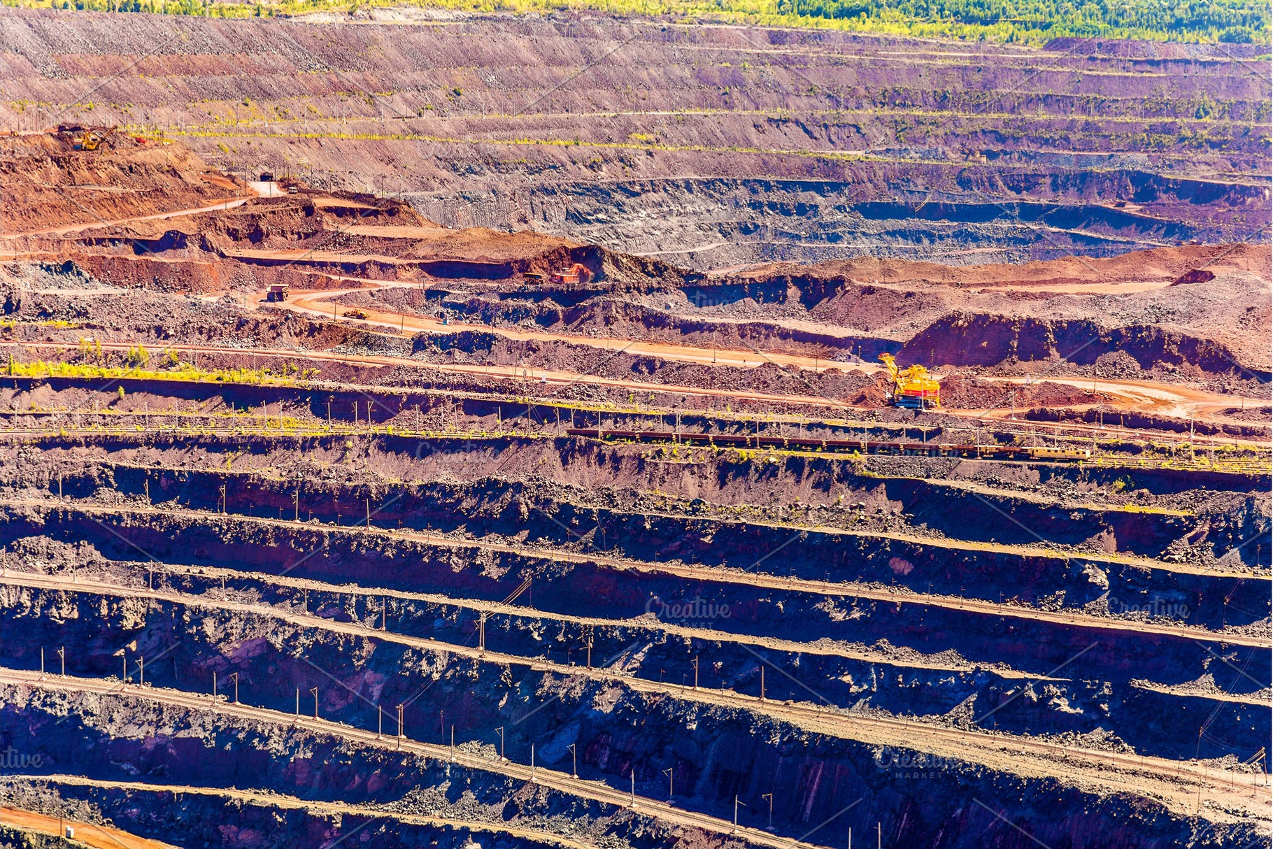 Iron ore mining in mikhailovsky field within kursk magnetic anom featuring, an Industrial Photo by Leonid Andronov