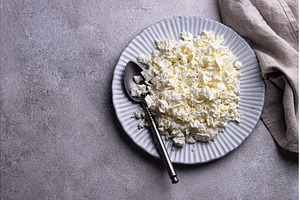 Cottage cheese on light background, a Food & Drink Photo by Yulia Furman