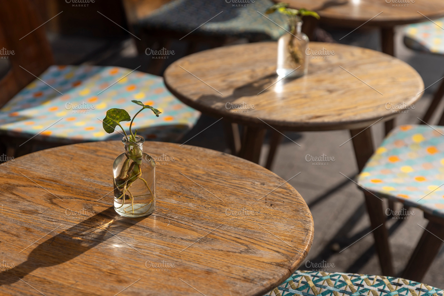 Cozy outdoor cafe, an Architecture Photo by Imaginarium