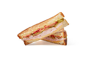 Two slices of club sandwich made, a Food & Drink Photo by Yaroslav Danylchenko