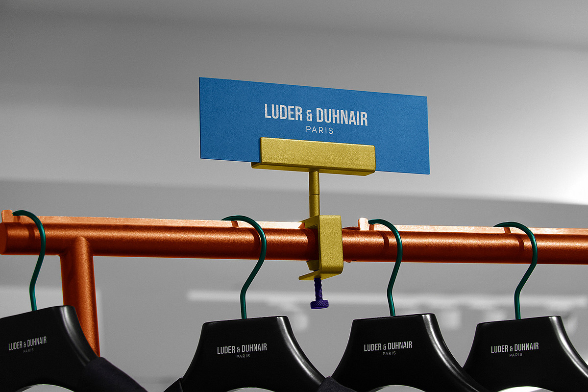 Logo Mockup Clothing Hanger Sign, a Product Mockup by Asylab (Photo 3 of 5)