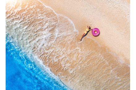 Aerial view of young woman with pink, a Person Photo by den-belitsky