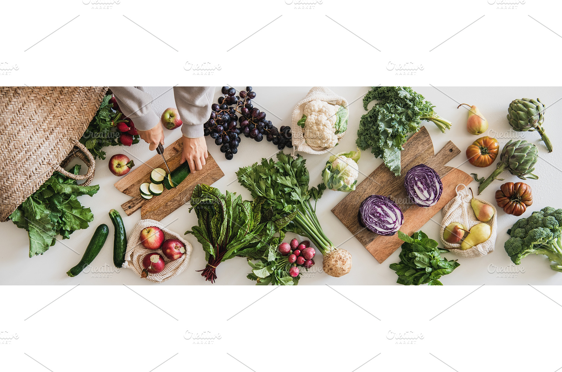 Female hands cutting cucumber over, a Food & Drink Photo by Foxys