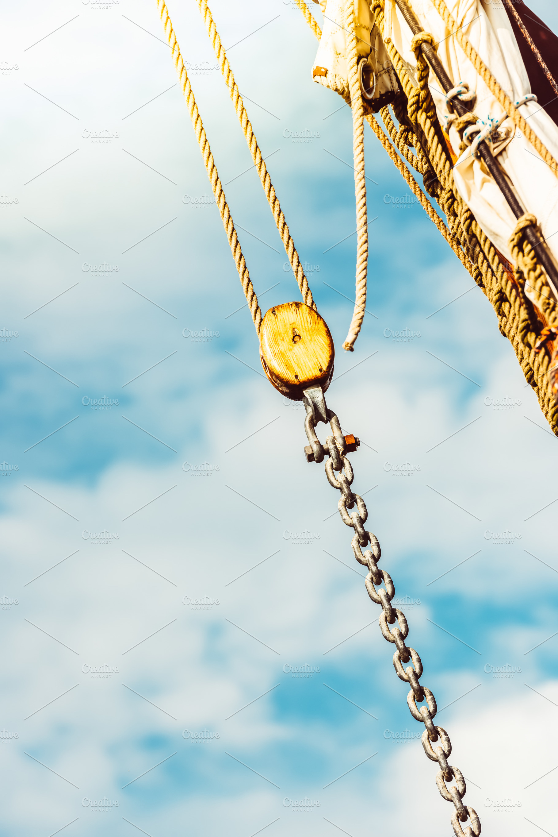 Sailboat rigging details against, a Photo by Dvoevnore photos