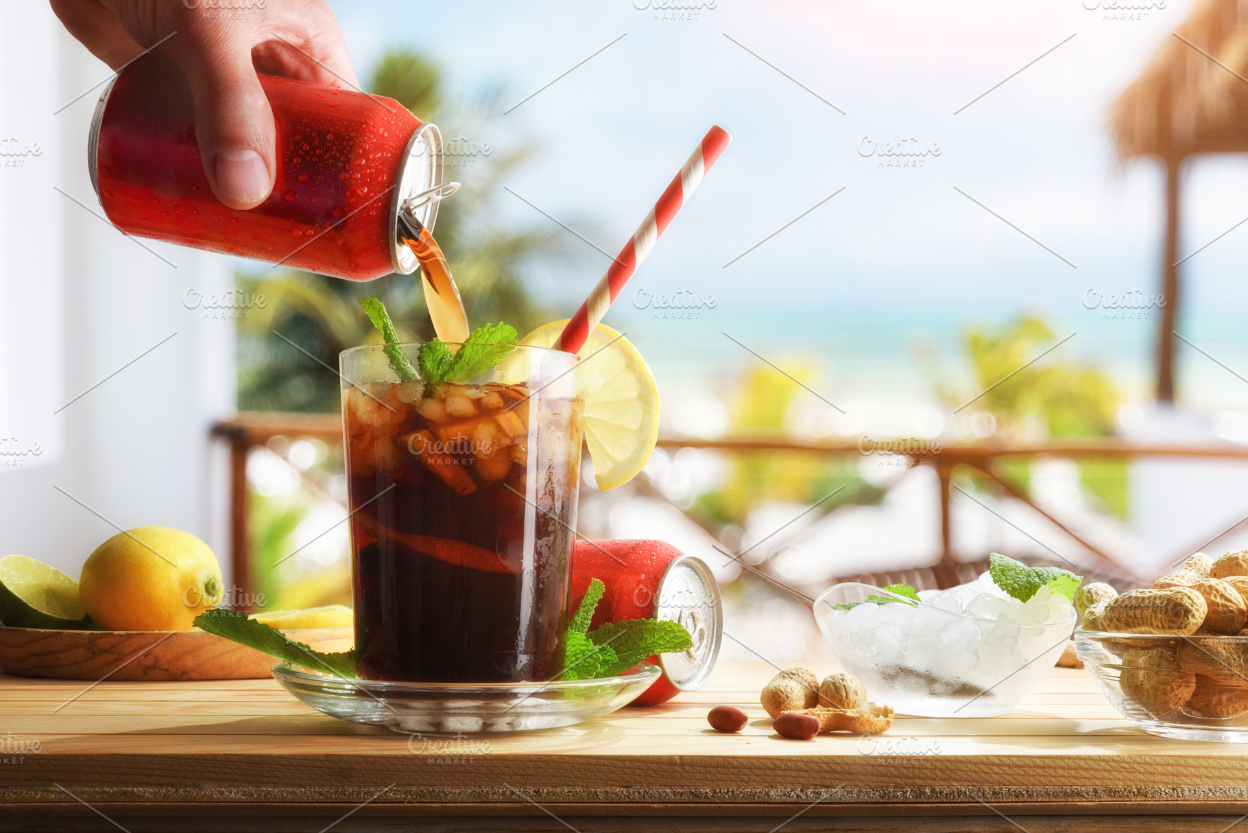 Drinking cola on table with appetizers on beach terrace, a Food & Drink Photo by Davizro's Market