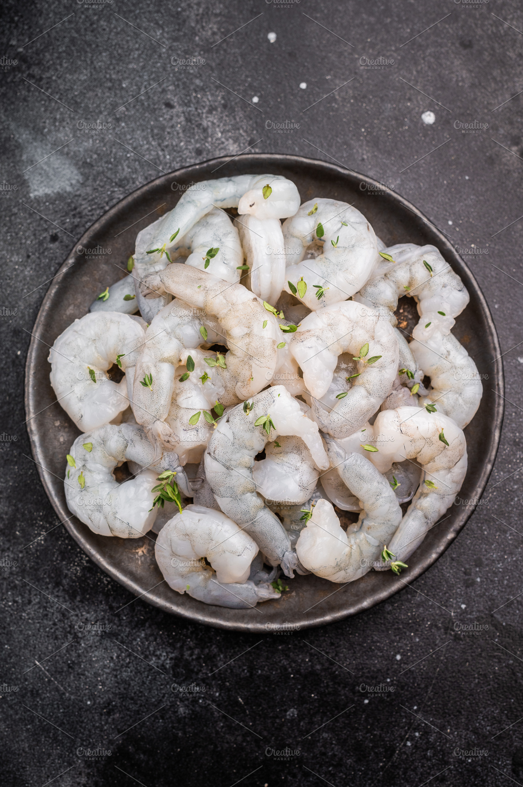 Uncooked prawns ready for gourmet cooking. Dark, moody shot with, a Food & Drink Photo by composter-box@mail.ru