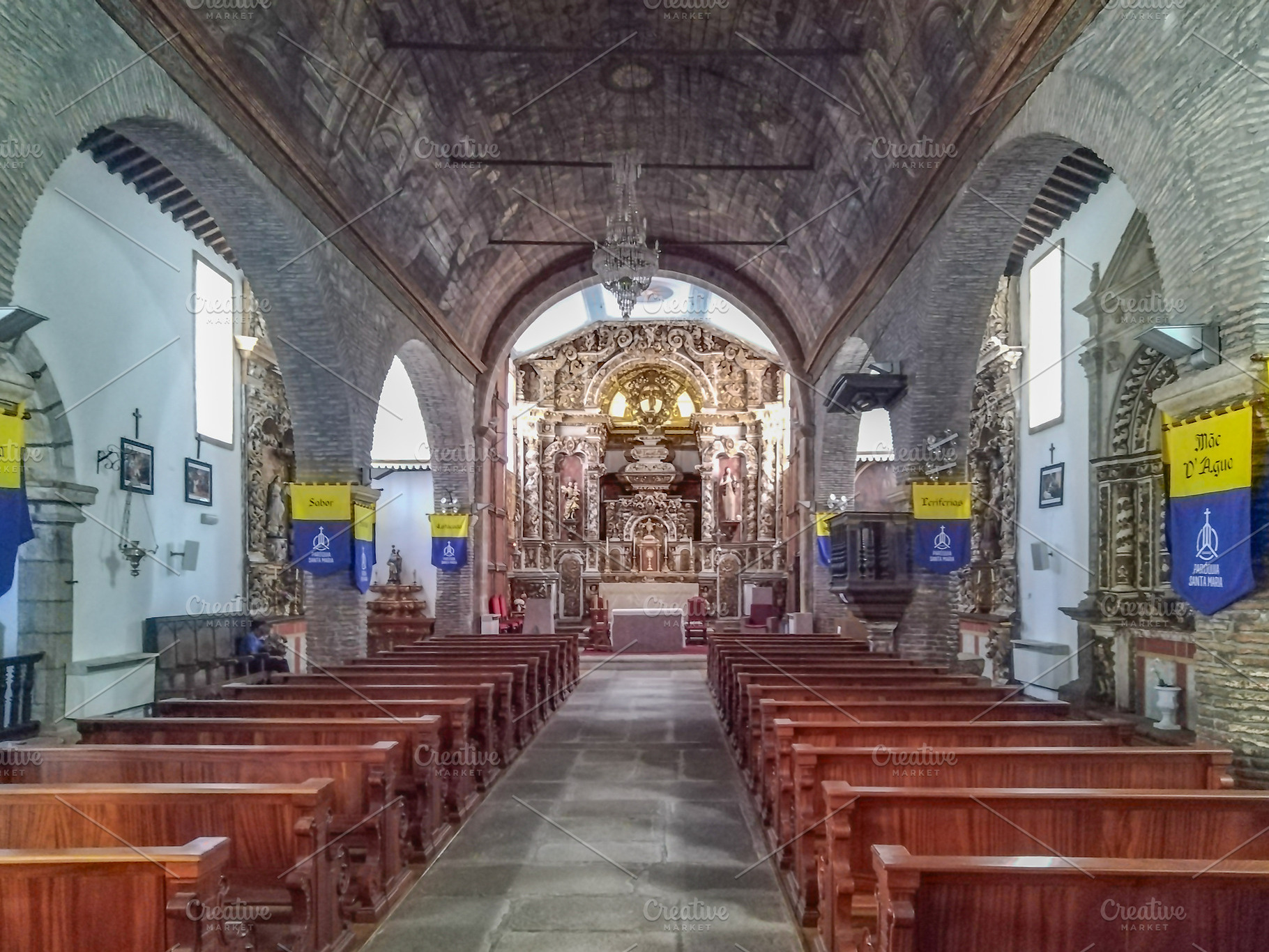 Interior of ornate catholic church with symmetrical pews, an Architecture Photo by DanFLCreativo