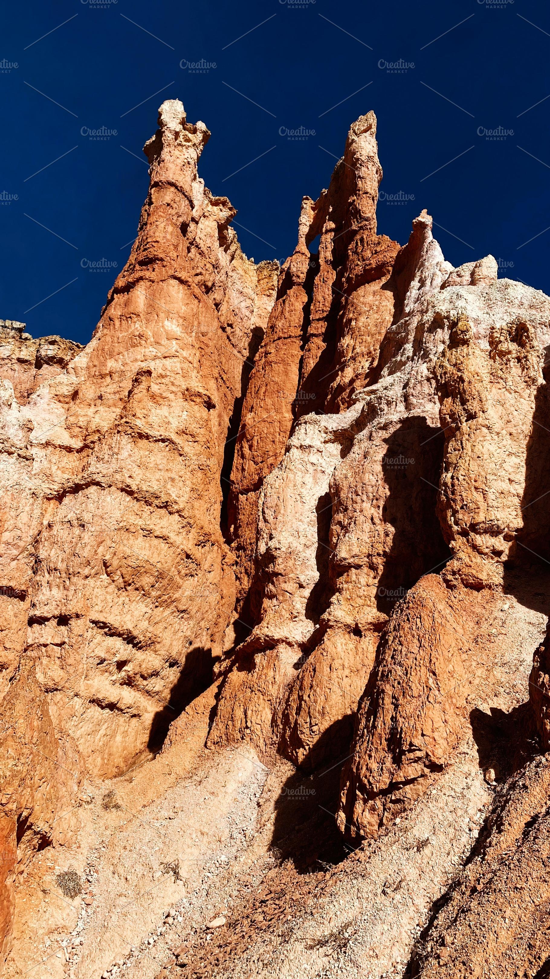 Utah red rock formations under blue sky in a dramatic desert canyon landscape, a Nature Photo by AS photostudio