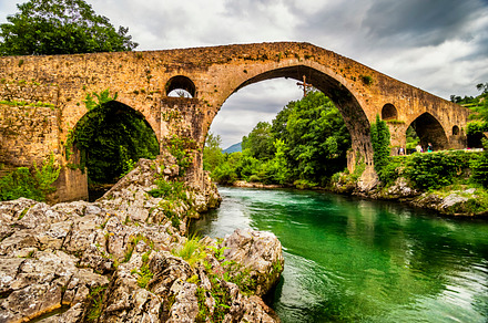 Roman bridge in cangas de onis featuring ancient, architecture, and art