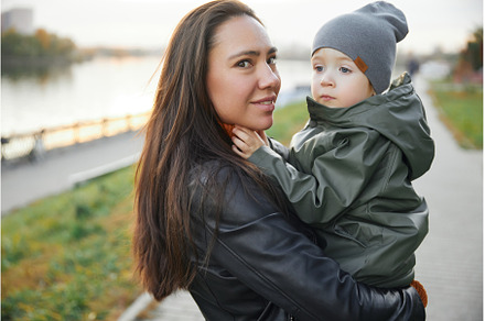 beautiful woman with a baby in her, a Person Photo by Super duper stock images 