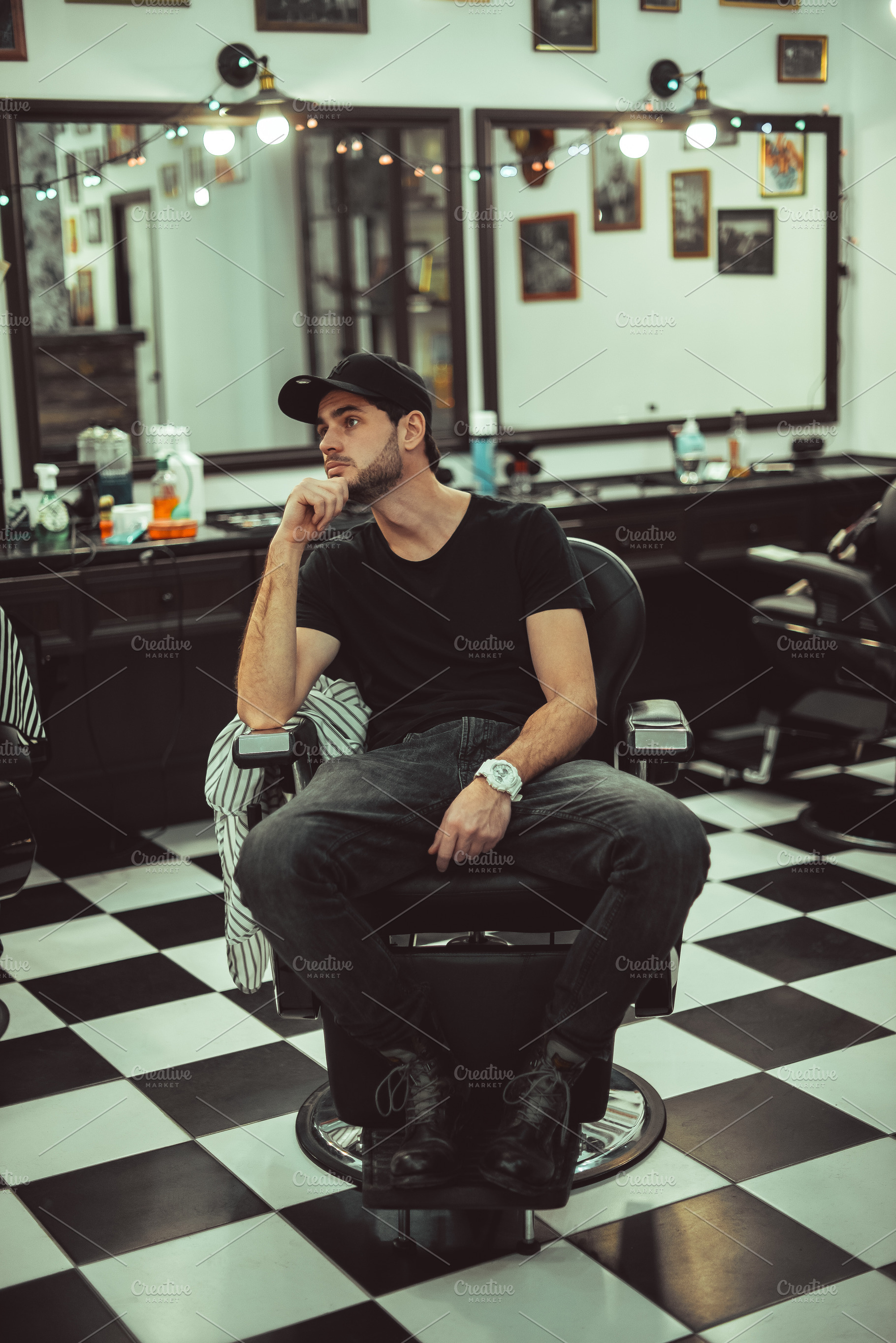 Man is sitting in a barber's chair barber shop containing barber, chair, and, a Person Photo by Rov.7