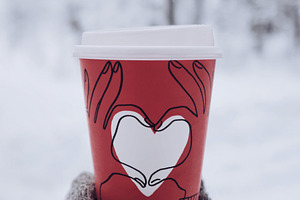 Cup of coffee to go with heart