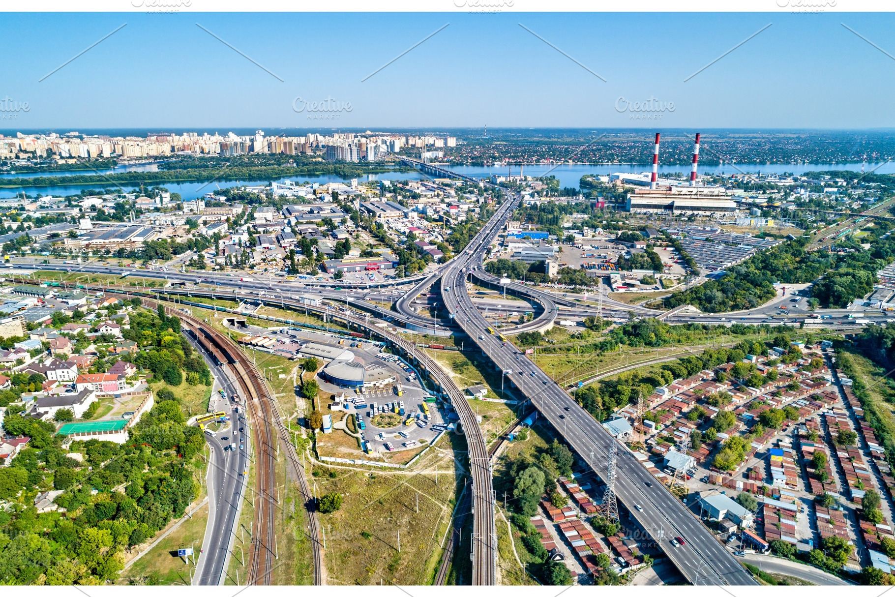 Aerial view of a road and railway featuring aerial, bridge, and city, a Transportation Photo by Leonid Andronov