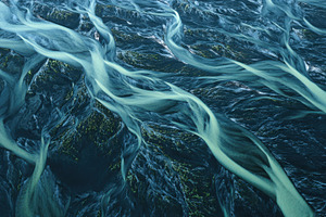 Flowing water in a river at dusk, a Photo by Beautiful things
