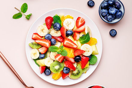 Summer healthy fruit and berry salad with strawberries, blueberr, a Food & Drink Photo by 5PH