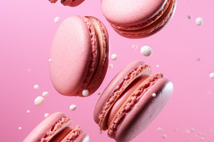 Different types of macaroons in motion falling on a pink backgro, a Food & Drink Photo by Natalia Klenova's Shop