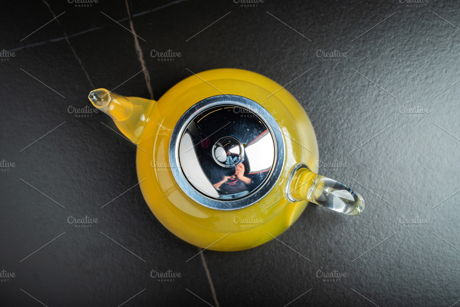 Fruit tea with mango and mint in a glass teapot on the table, a Food & Drink Photo by Budarinphoto