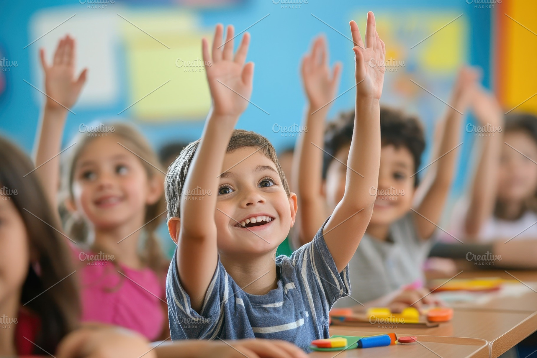 School children raising their hands, a Photo by Pavel_design