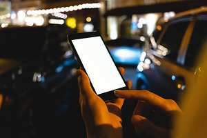 Mobile phone in female hands