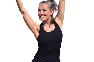 Woman practices pilates on a rugged rocky surface, a Person Photo by DanFLCreativo