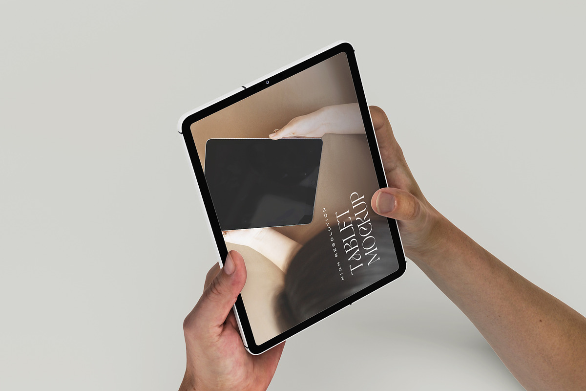 Digital Tablet Holding Mockup Scene, an iPad Mockup by Ataku Design (Photo 5 of 8)