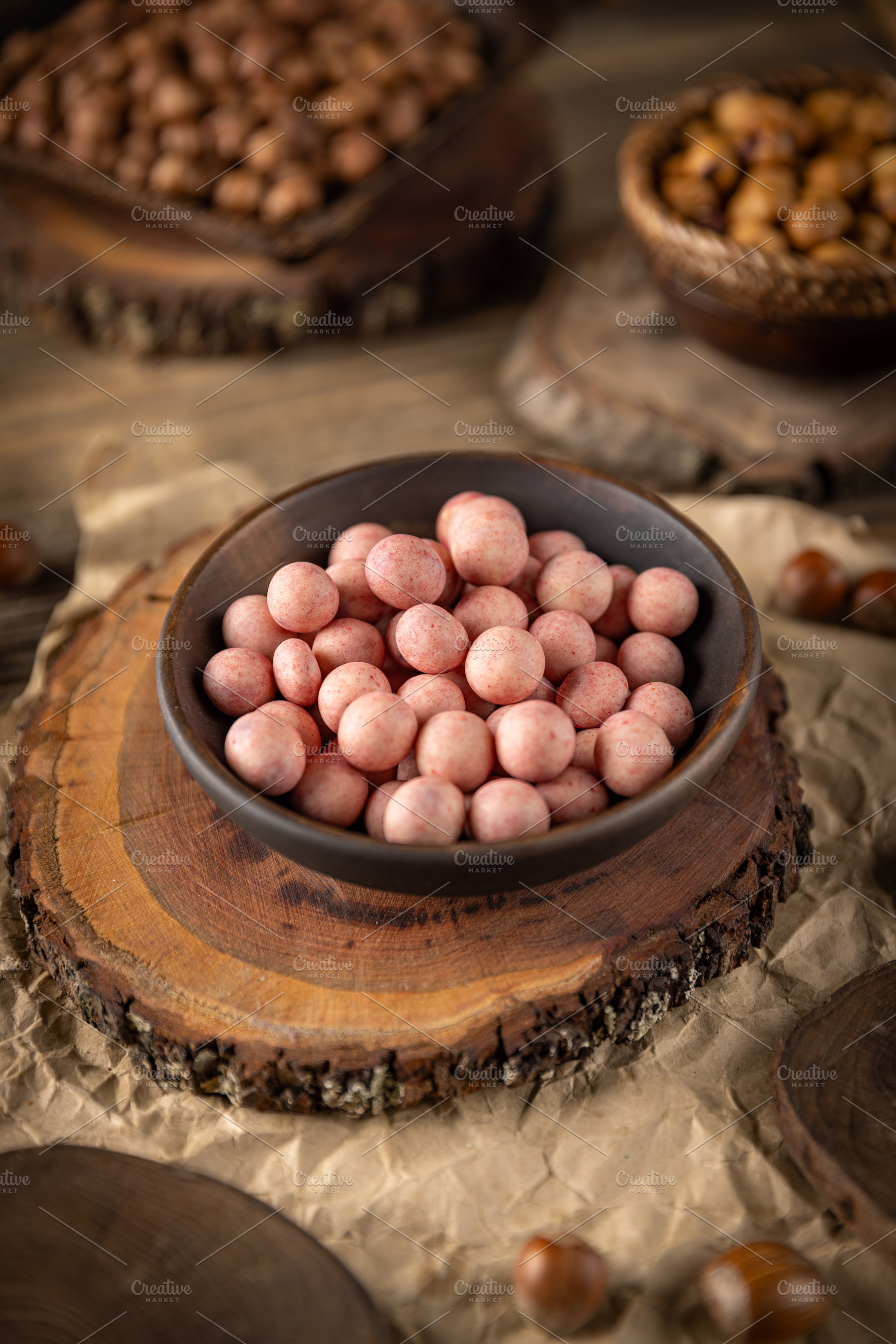 Bowl of covered hazelnuts, a Photo by Grafvision photography