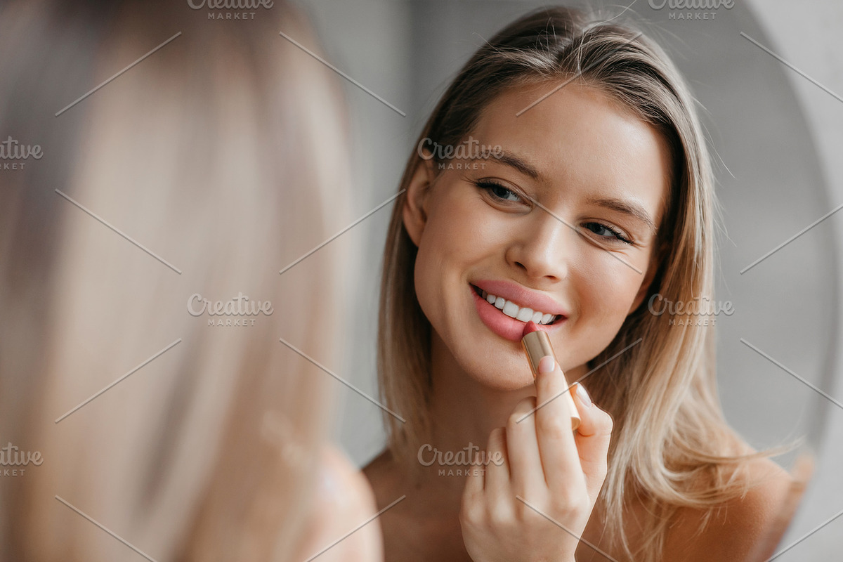 Routine procedures and decorative cosmetics for homemade visage. Happy young wo, a Photo by Prostock-Studio (Photo 1 of 2)