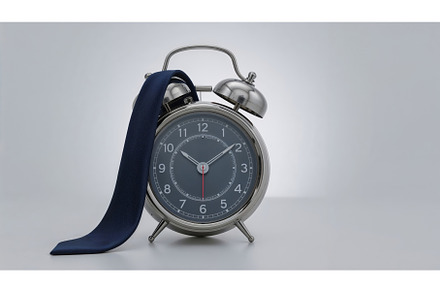 Classic silver alarm clock with dark