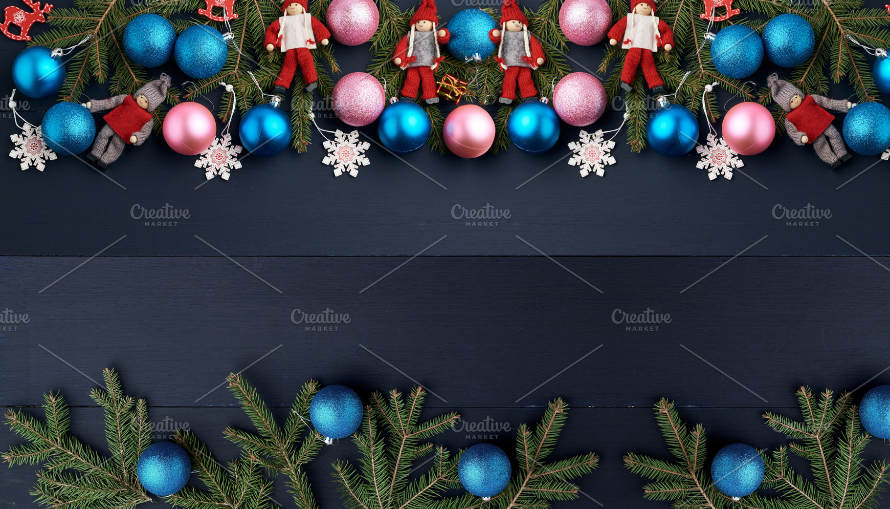 A frame of fir branches, blue and pink Christmas tree baubles, a, a Holiday Photo by ndanko