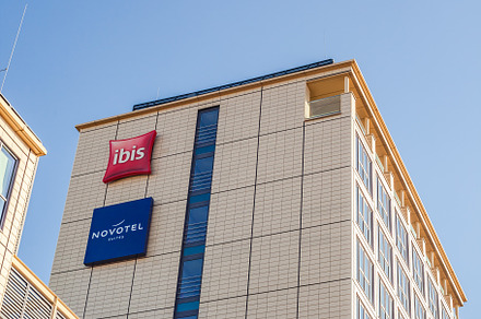 Novotel suites Ibis logo at hotel building Munich, an Architecture Photo by Dvoevnore photos
