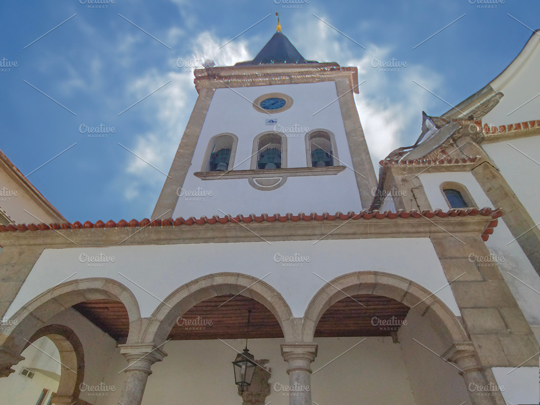 Baroque church tower in harsh sunlight, braganca, portugal, an Architecture Photo by DanFLCreativo