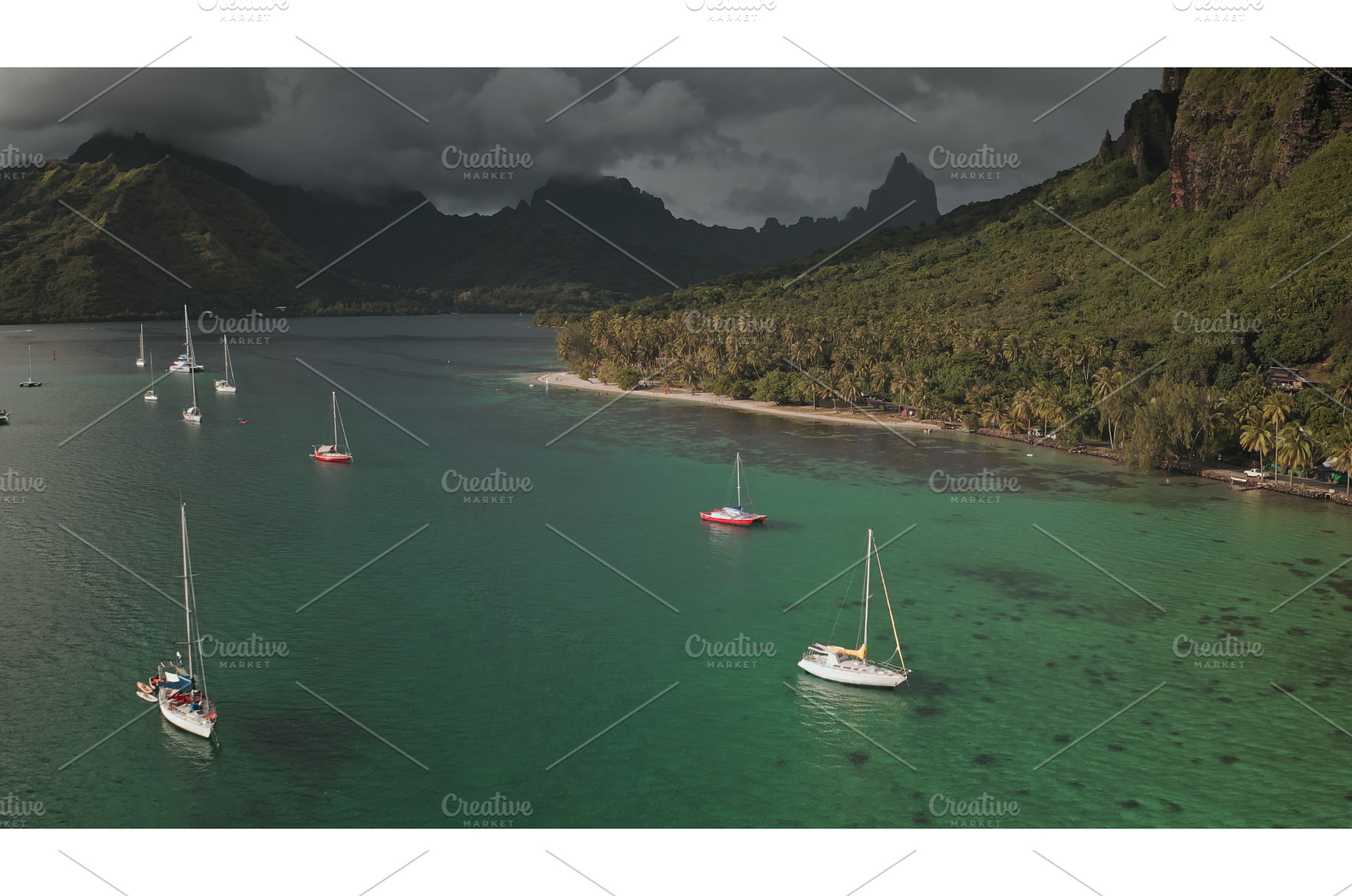 Sailboats anchoring in Opunohu bay, a Transportation Photo by Goinyk