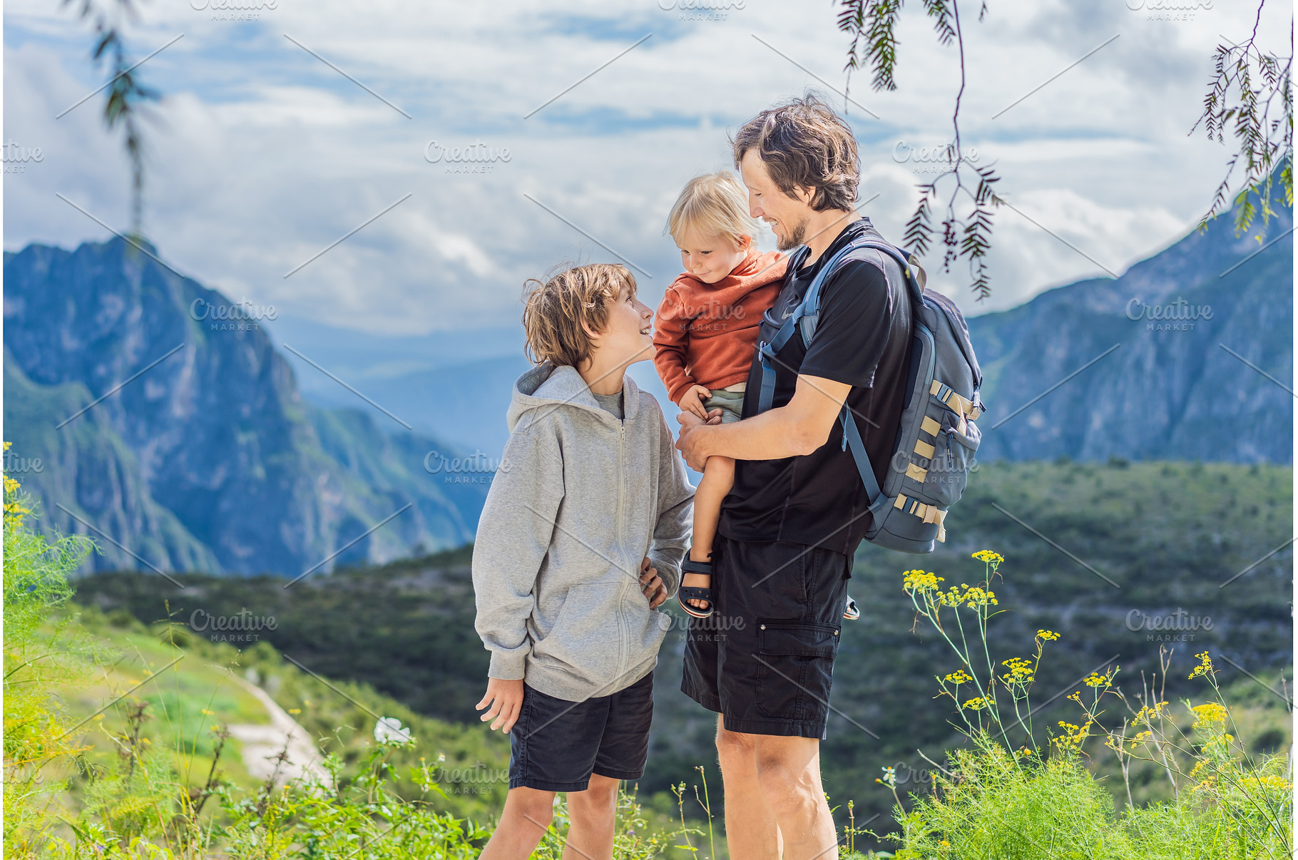 Father with his two sons standing in, a Nature Photo by Elizaveta Galitskaya