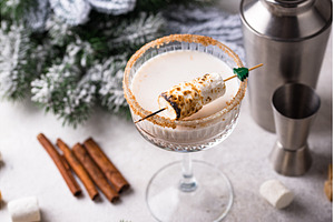 Christmas cocktail with toasted, a Holiday Photo by Yulia Furman