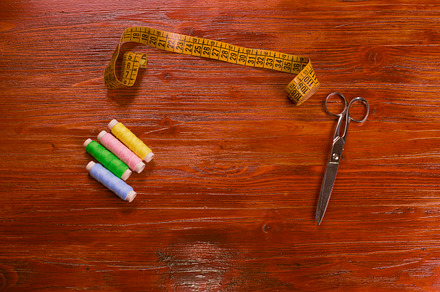 Colored threads, scissors, and tape, a Beauty & Fashion Photo by José Luis Agudo