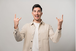 Let's rock it. Handsome brunette man, a Person Photo by AD Stock Images