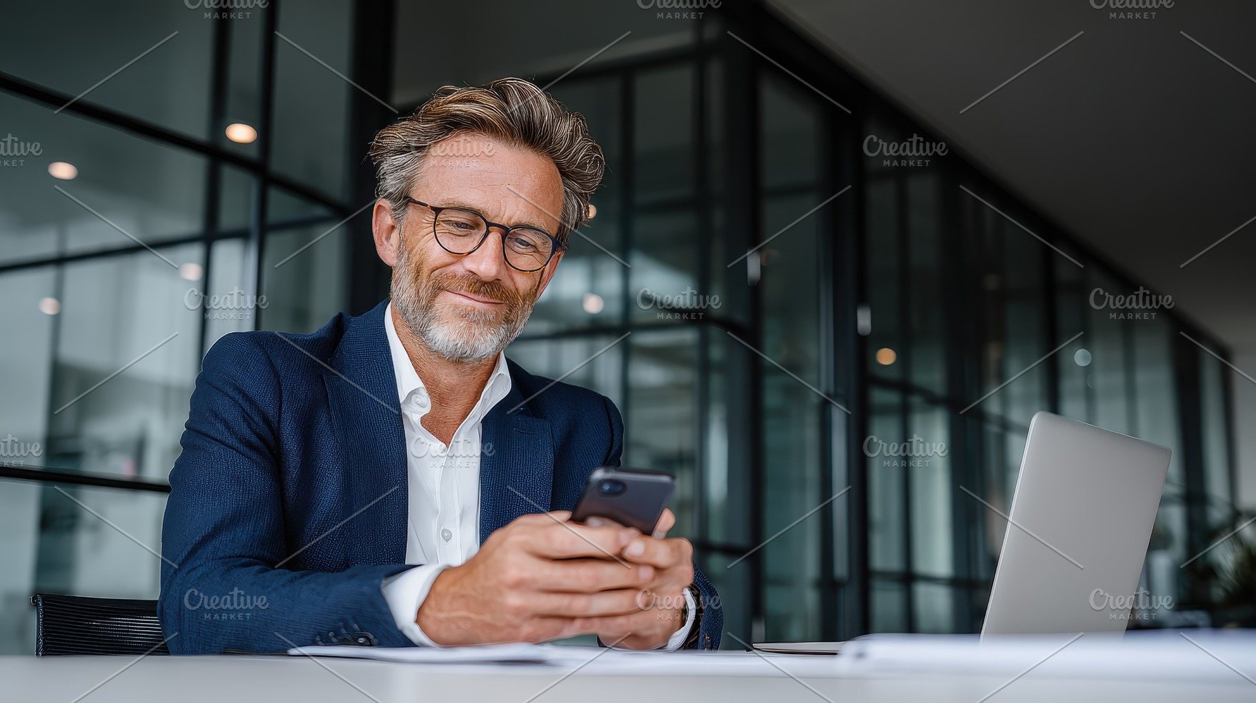 Businessman using smartphone in mode, a Photo by Pixeness Studio