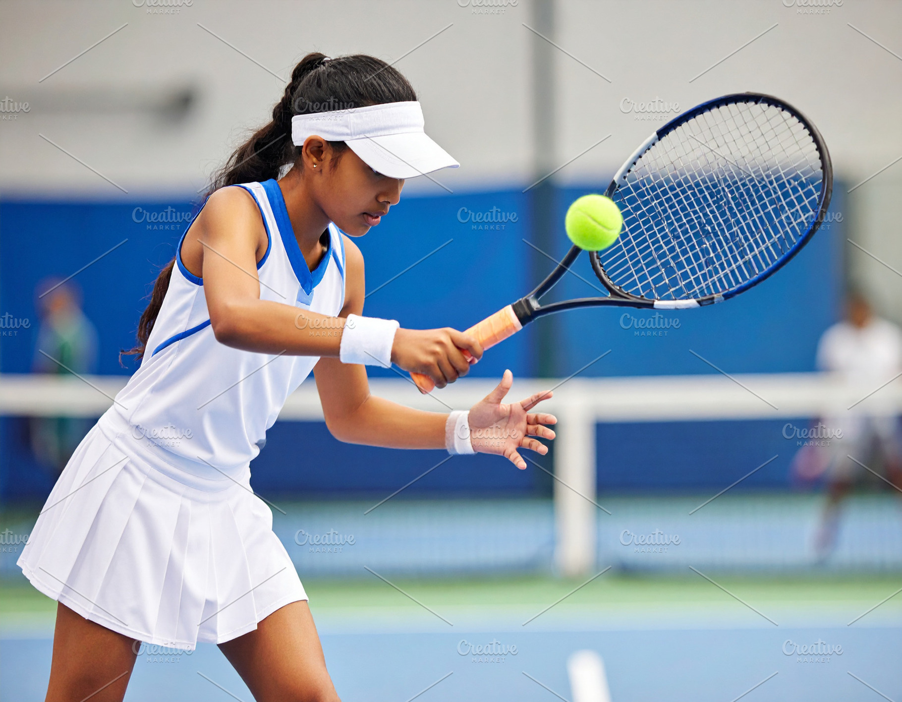 Side view medium shot girl playing tennis, a Sports & Recreation Photo by DanFLCreativo