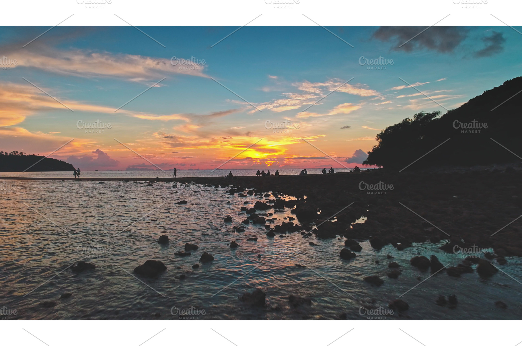 Tourists enjoying sunset at Koh Ma, a Nature Photo by Goinyk