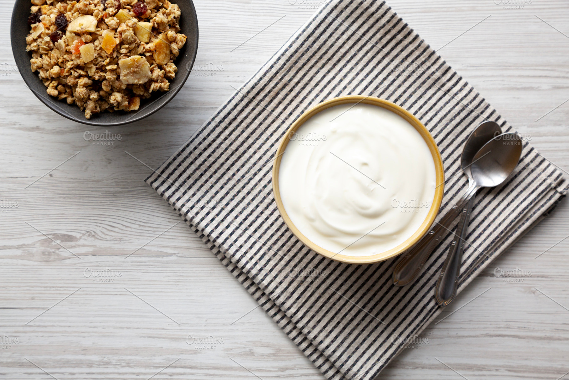 Organic Whole Fat Greek Yogurt in a Bowl, top view., a Food & Drink Photo by LiudmylaChuhunova