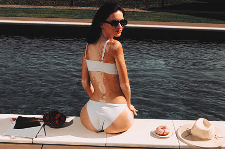 Beautiful girl by the pool, a Person Photo by BUTKO Magazine