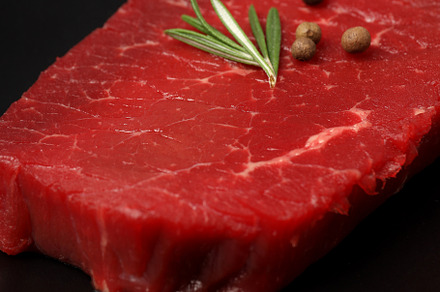 Concept of cooking with raw beef steak, close up, a Food & Drink Photo by AtlasStudio PRO