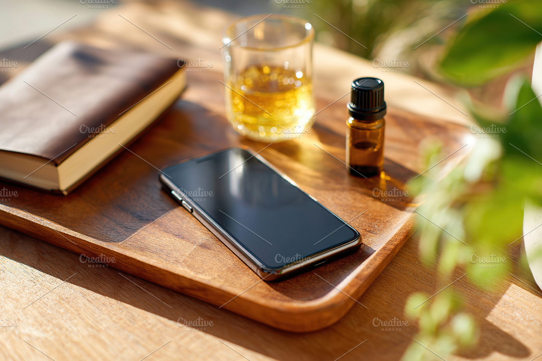 Creating a calming environment with essential oils and journaling in a sunlit s, a Technology Photo by AlyaAnd