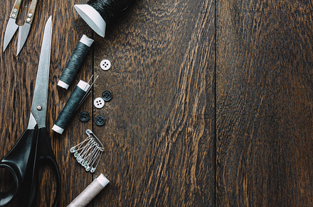 Tailor items on wooden featuring abstract, accessories, and background, an Industrial Photo by OSABEE TOP VIEW