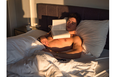 Shirtless man in bed sleeping with a, a School & Education Photo by ArtOfPhotos photo store