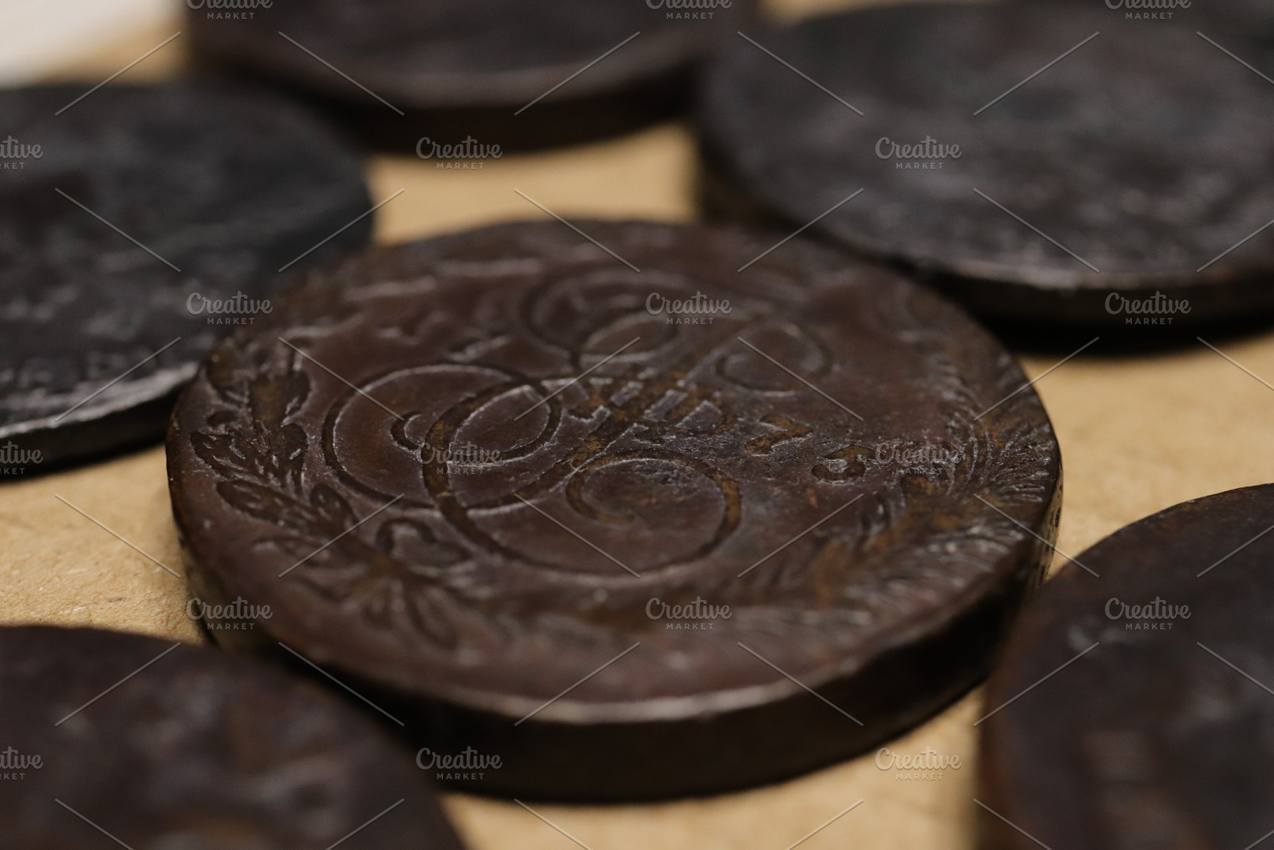 A close-up view of antique Russian Empire 5 kopecks of Catherine II coins with, an Industrial Photo by Textures & Backgrounds