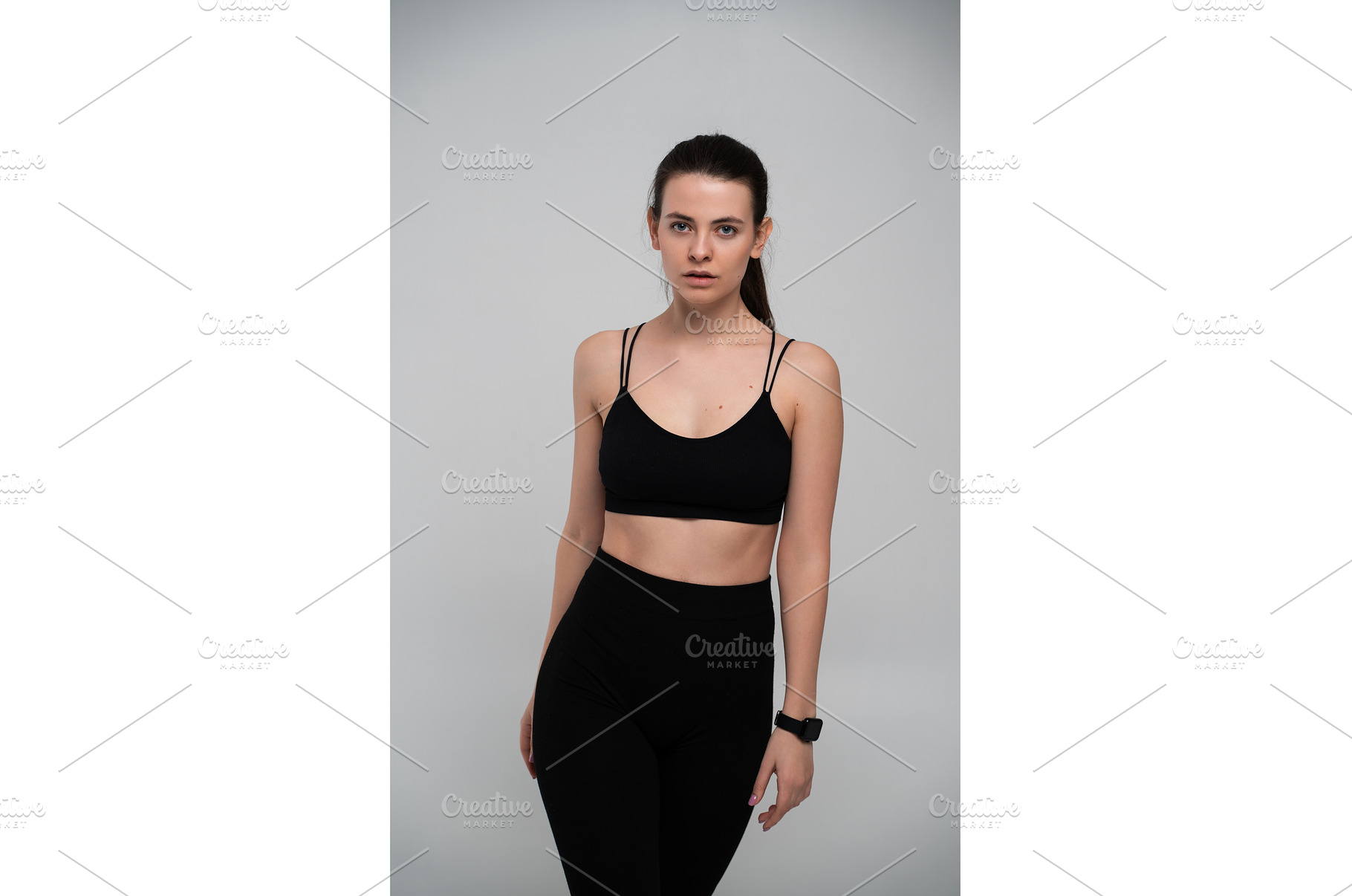 Young athletic woman in black, a Sports & Recreation Photo by volodymyrshtun13795